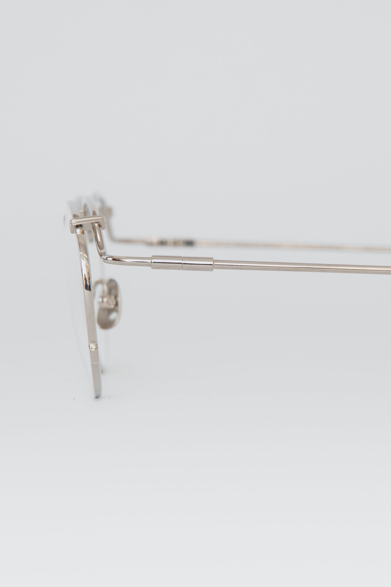 G90 / FRAME-POLISHED TITANIUM LENS-CLEAR